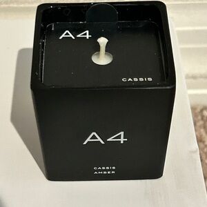 MIND GAMES A4 CASSIS AMBER 2 OZ LUXURY CANDLE